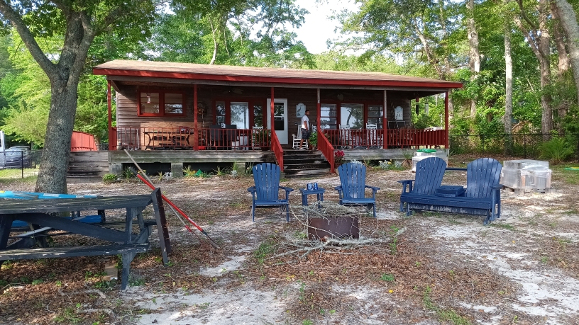 Freshly painted charcoal exterior wall with crisp white trim